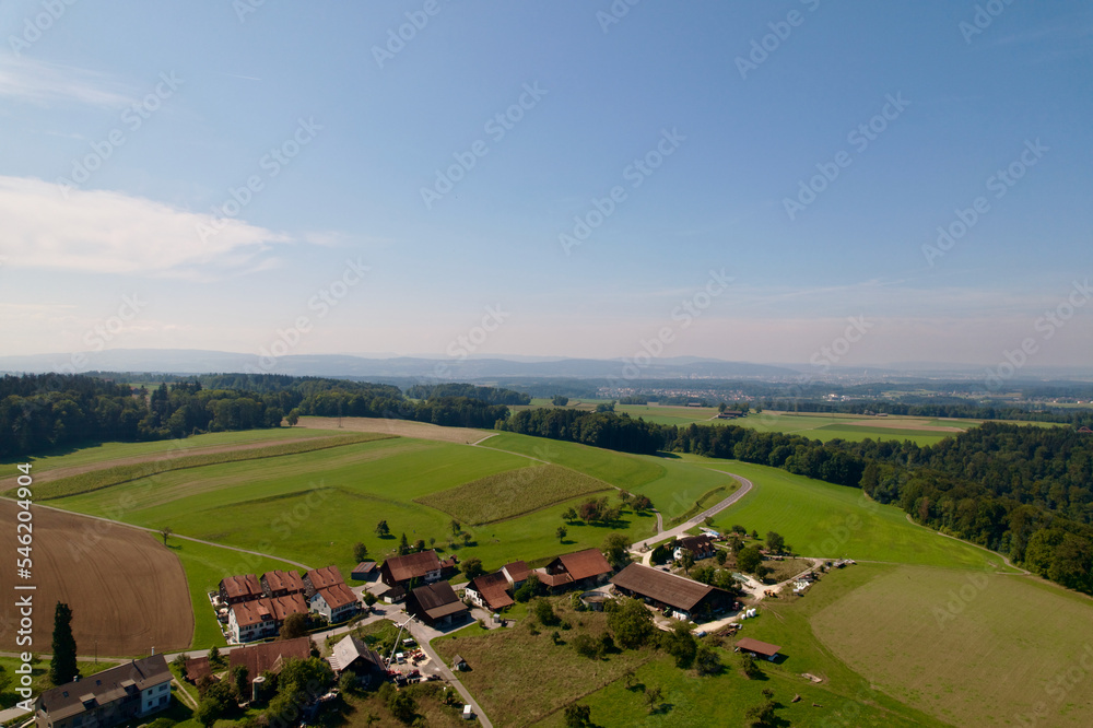 Aerial view of agriculture landscape around rural village of Kyburg, Canton Zürich, on a sunny late 