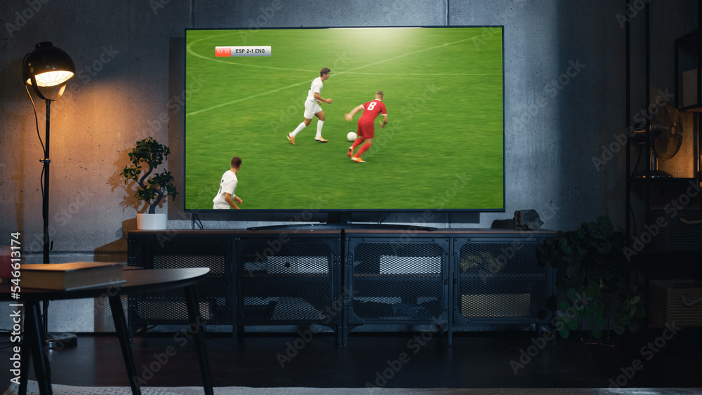 Shot of a TV with Soccer Match on Big Flat Screen Televison Set. Live Broadcast of Football World Ch