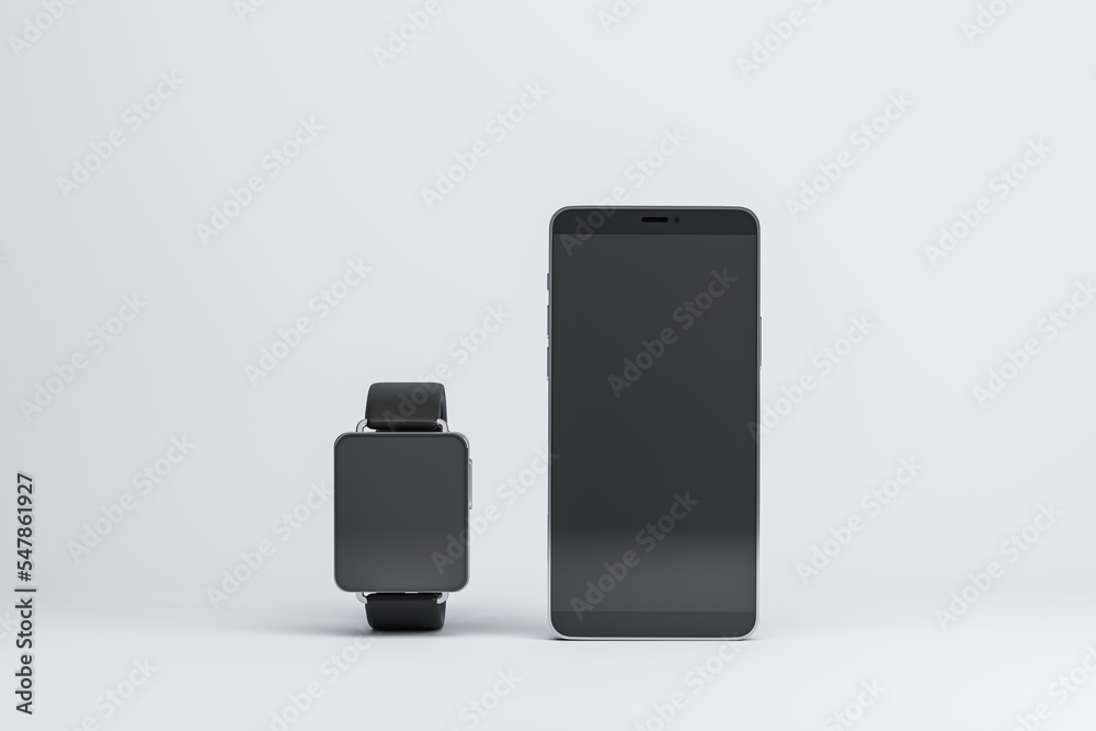 空白黑色现代智能手机和智能手表屏幕的前视图，有空间放置您的徽标或te