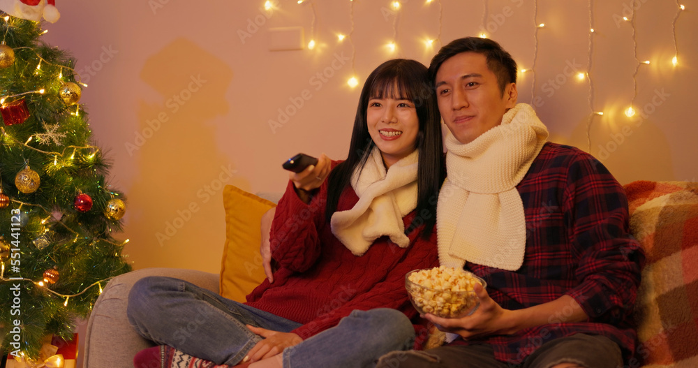 couple watch tv together