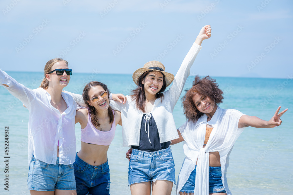 Young friends have fun on the beach,Concept vacation,Holiday in summer.