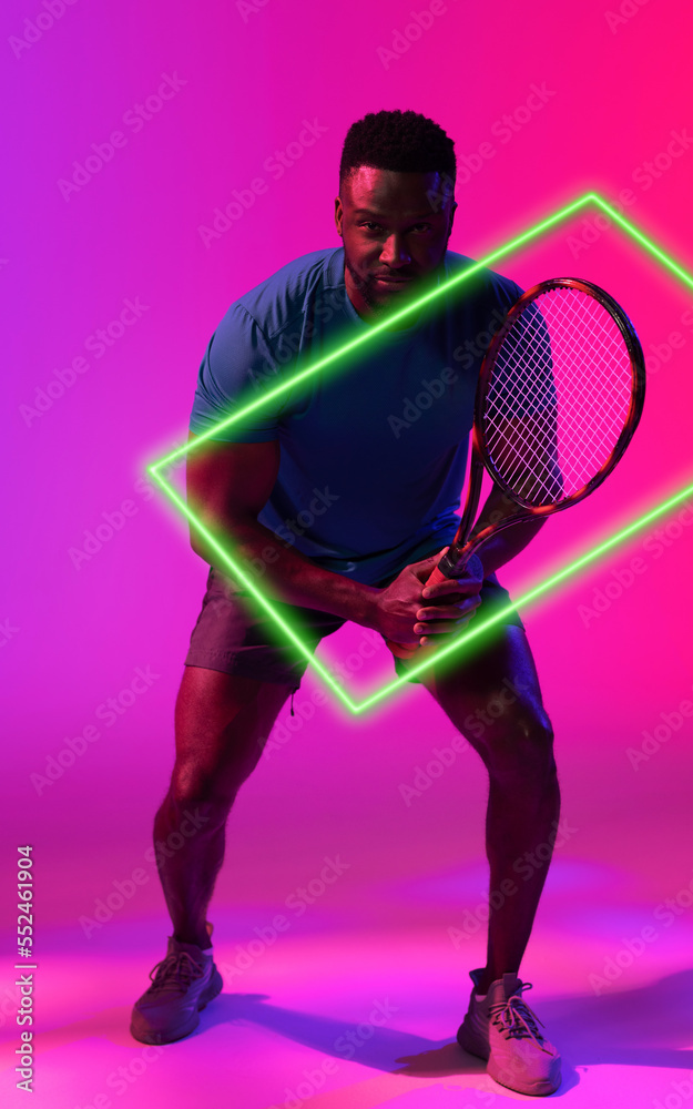 Rectangle neon over young african american tennis player with racket over colored background