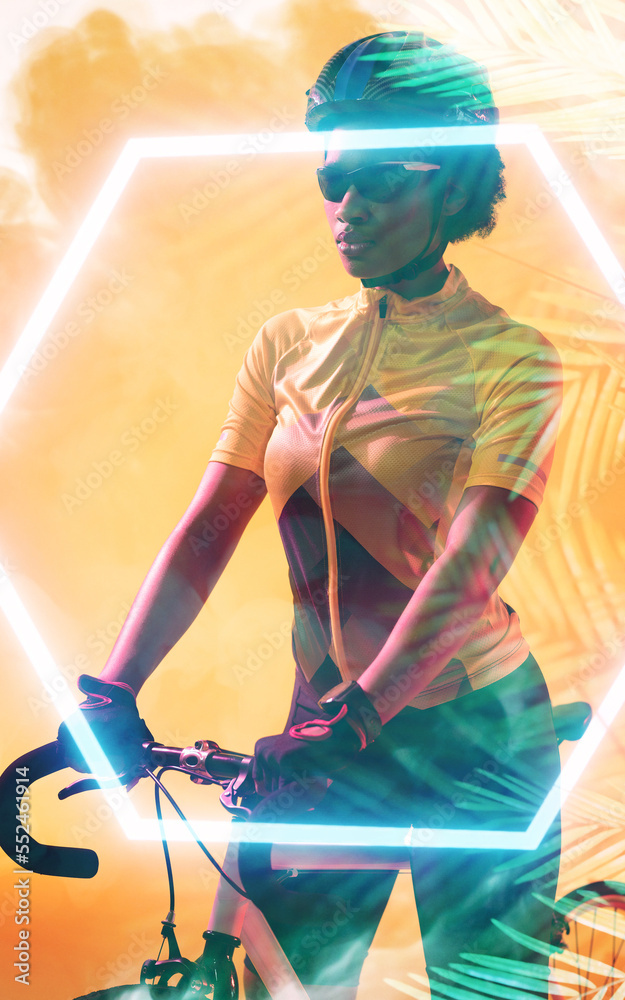 Multiple exposure of confident young african american female cyclist in sunglasses over leaf pattern