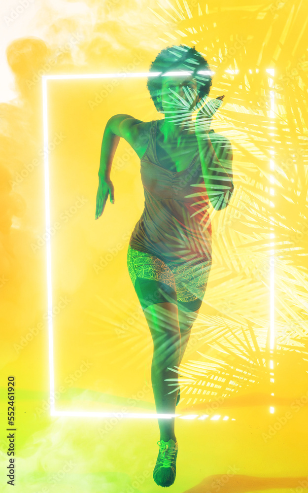 Multiple exposure of african american female athlete running with leaf pattern on yellow background