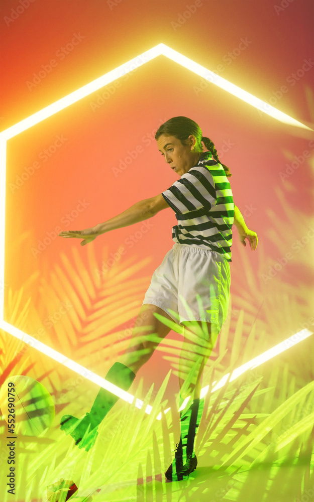 照亮的六边形和植物覆盖高加索女橄榄球运动员在彩色背景上踢球