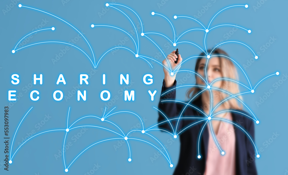 Businesswoman writing on virtual screen against blue background. Concept of sharing economy