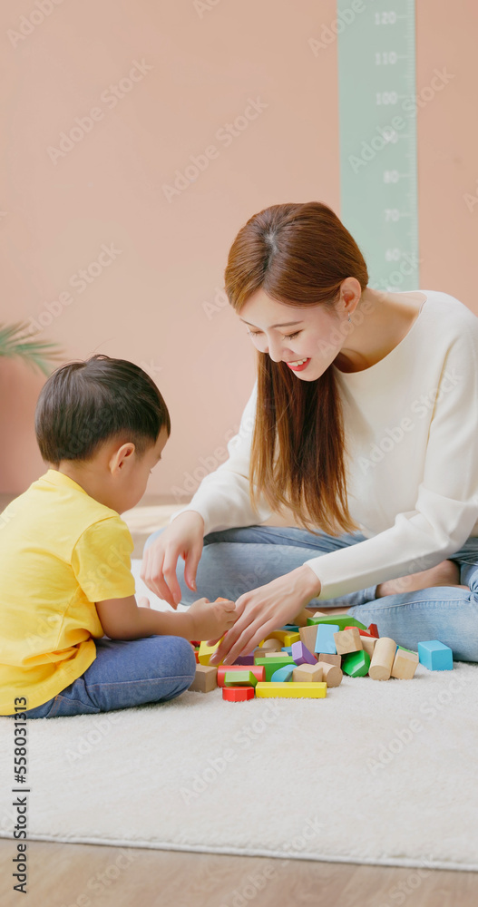 Family playing with building blocks