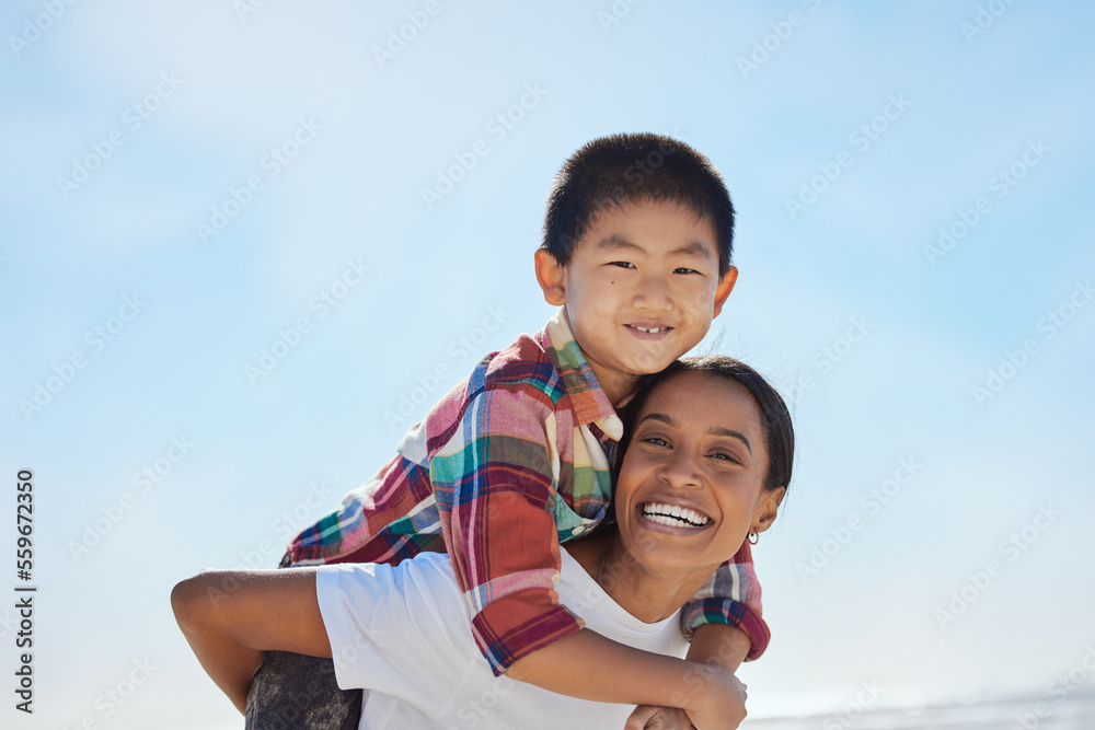 Mother, beach piggyback and child in portrait, interracial family bonding and outdoor vacation in su