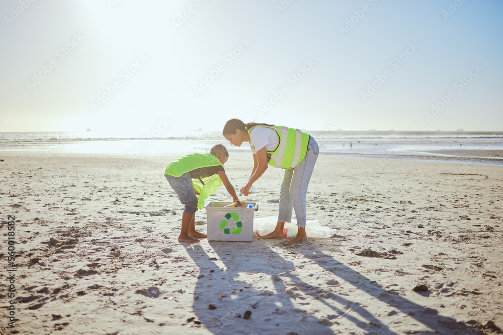 Recycle, plastic and woman with child in beach cleaning support for sustainability, green environmen