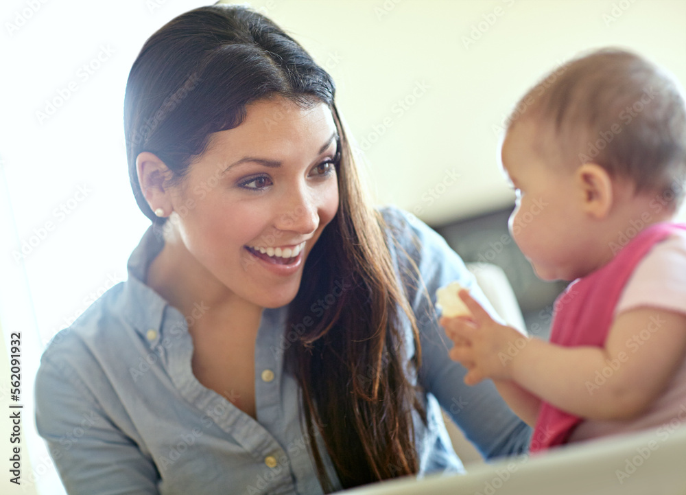 Mother, baby child and smile by chair for play, bonding and love at table in morning with happiness.