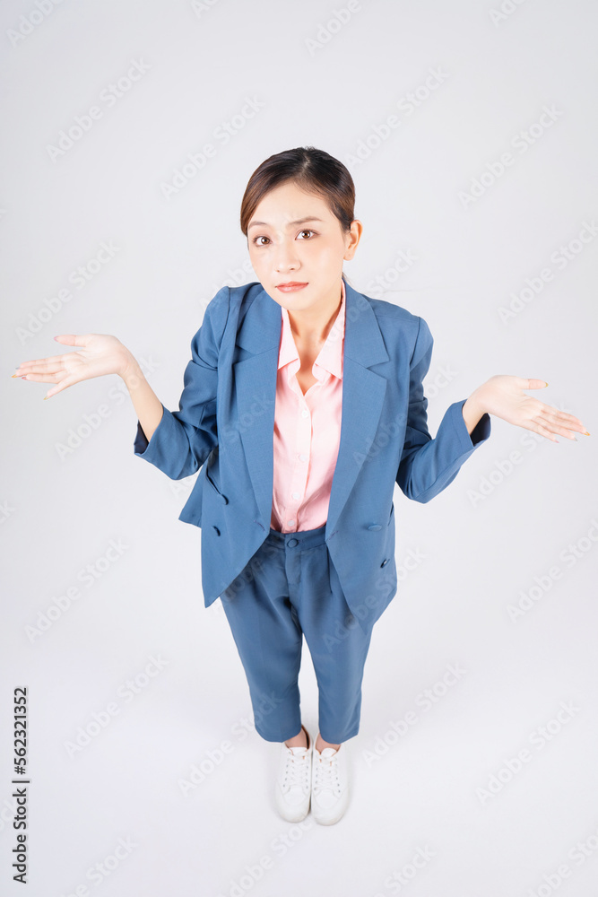 Full length image of young Asian businesswoman