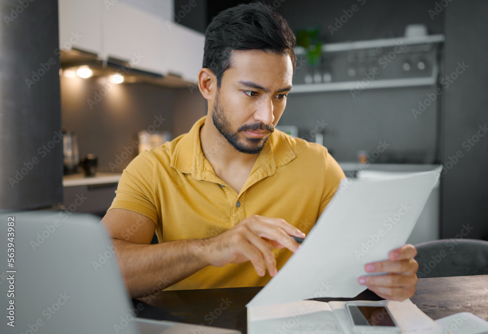 Businessman, home office and documents by laptop in kitchen for focus, small business growth and opp