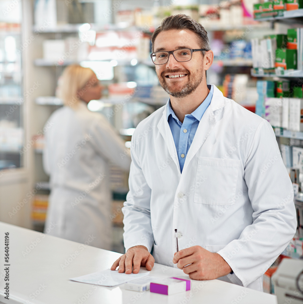 Portrait, service and pharmacist man at counter for medicine help, expert advice and healthcare phar