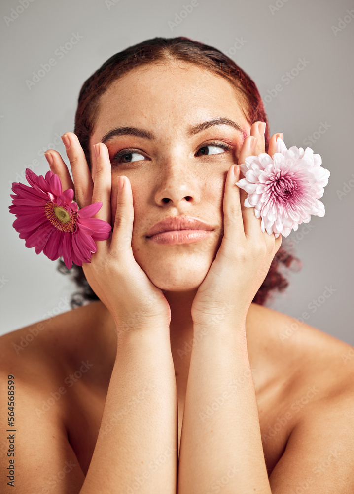 Woman, studio and face with flowers for thinking, beauty or healthy skincare for natural spring aest