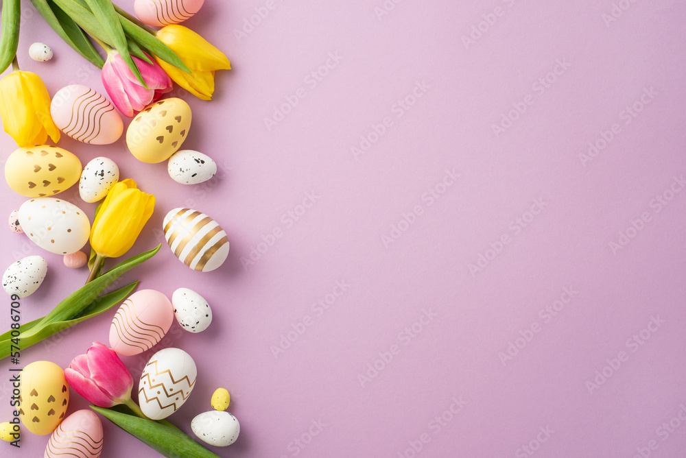 Easter decorations concept. Top view photo of colorful easter eggs spring flowers yellow and pink tu