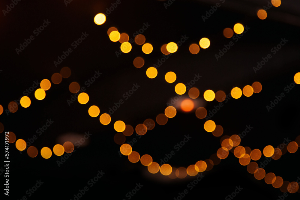 Bokeh night light at city for background. Beautiful circle glitter merry christmas and happy new yea