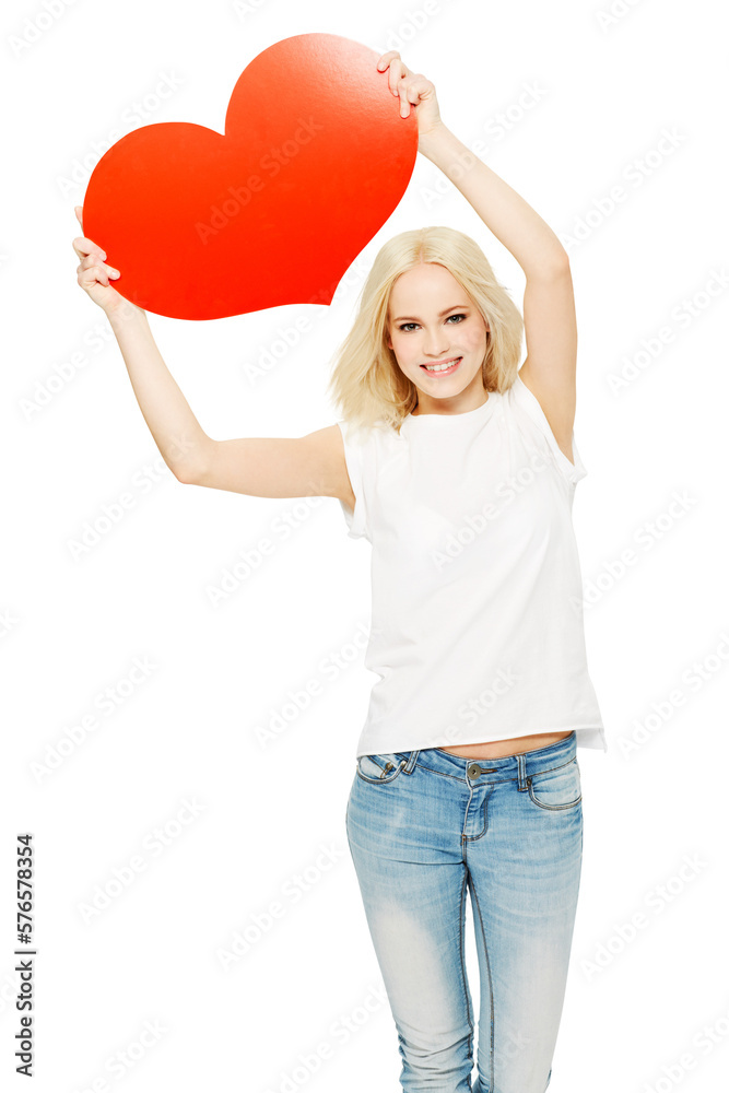 A happy woman or a romantic model holding or posing with a red heart-shaped cardboard poster in her 