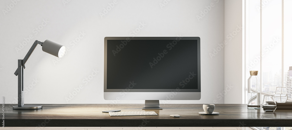 Blank dark modern computer monitor with space for your web site or web design on wooden table with c