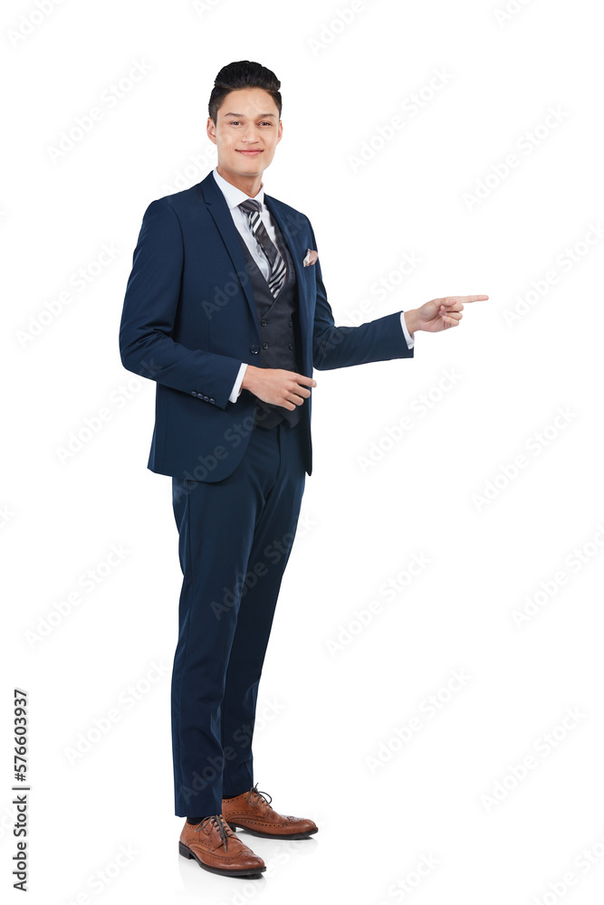 A young positive Asian business person or corporate worker pointing at a copy space and a financial 