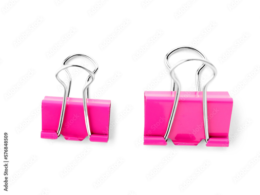 Pink binder clips isolated on white background