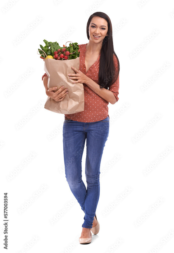A happy female customer or a model with a smiling face holding a shopping bag filled with organic fo