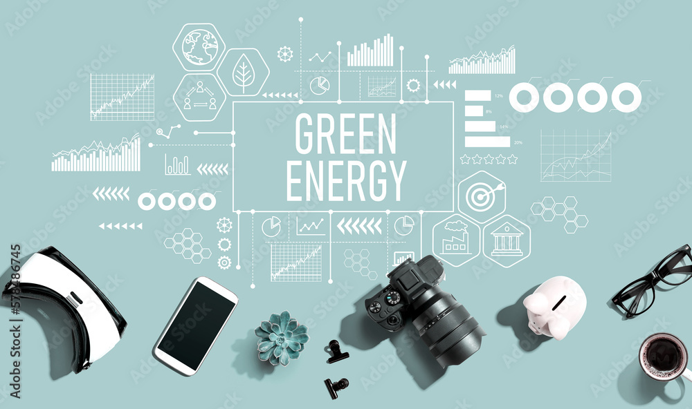 Green Energy concept with electronic gadgets and office supplies - flat lay