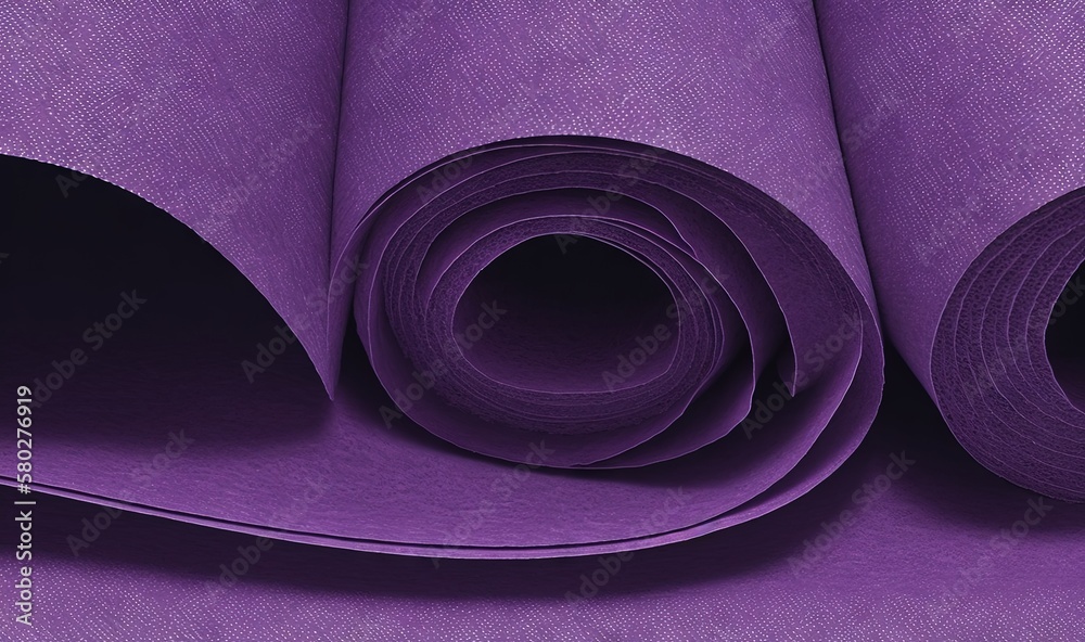  a roll of purple yoga mat on top of a purple sheet of cloth on the floor of a gym room with a purpl
