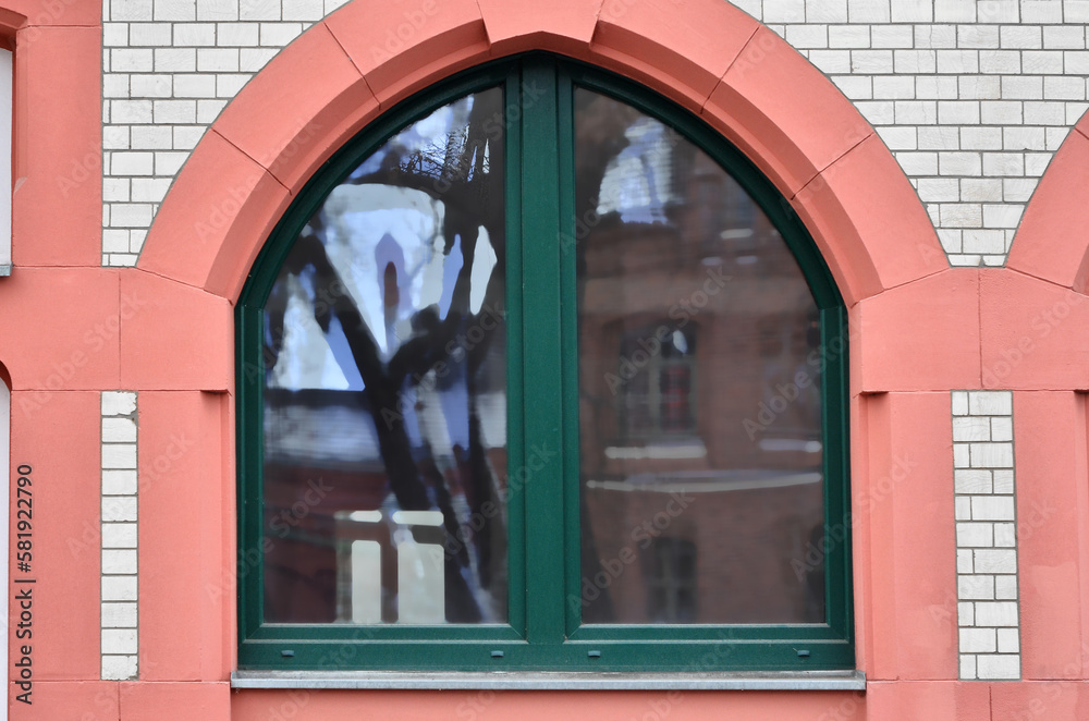 View of brick building with color window
