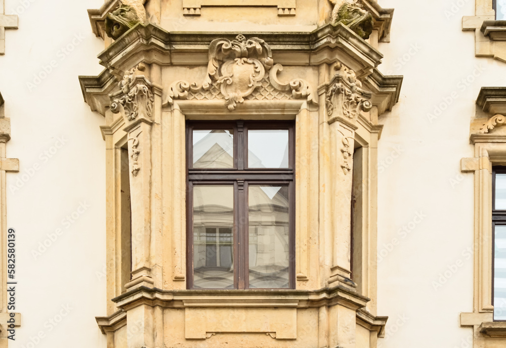 View of old building with wooden window