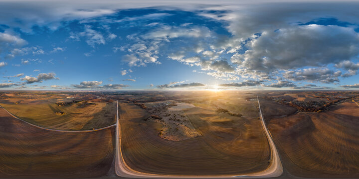 aerial full seamless spherical hdri 360 panorama view from great height above fields in countryside in equirectangular projection.  use like sky replacement for drone shots