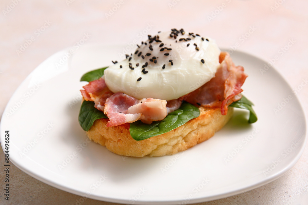 Plate with tasty egg Benedict on white table, closeup