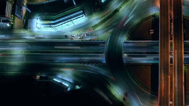 Expressway top view, Road traffic an important infrastructure, car traffic transportation above intersection road in city night sky aerial view cityscape of advanced innovation, financial technology	