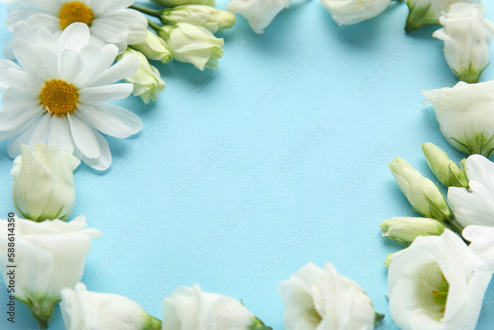 Frame made of beautiful eustoma and chamomile flowers on color background, closeup