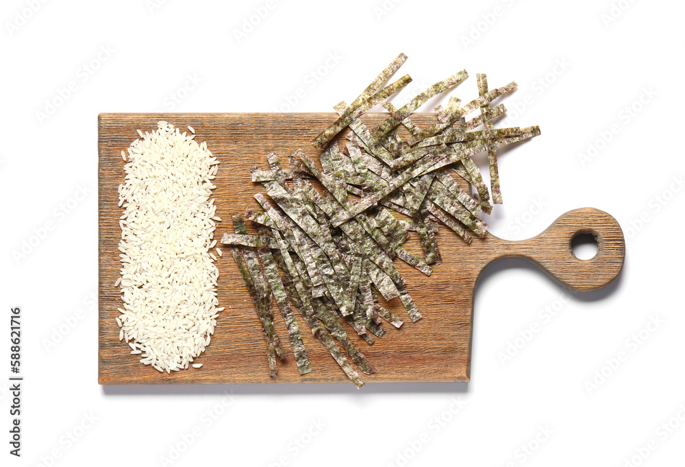 Wooden board with rice and cut nori sheets on white background