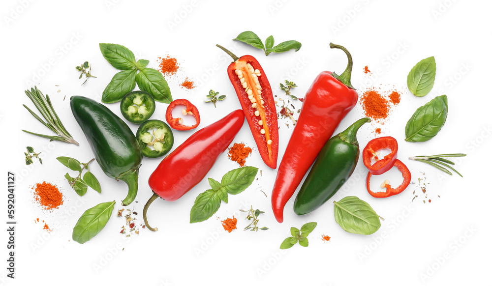 Composition with fresh herbs, spices and peppers on white background