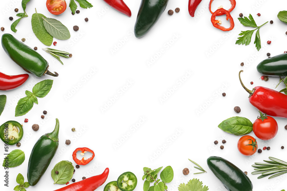Frame made of different spices, herbs and jalapeno peppers on white background