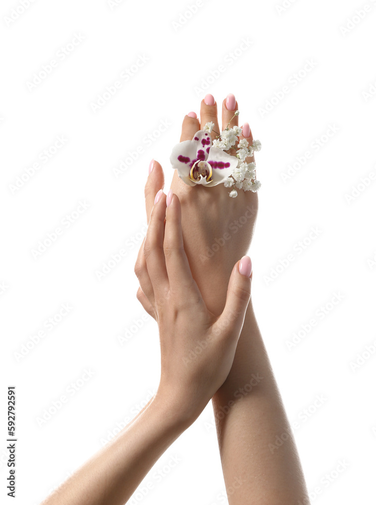 Woman with beautiful flowers on white background. Hand care concept