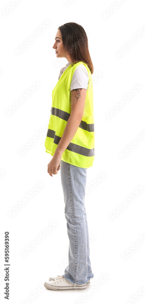 Female worker in vest on white background