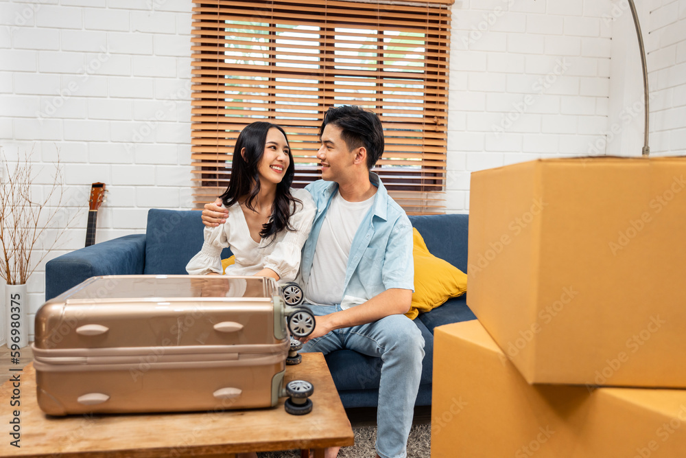 Asian young happy new marriage couple moving to new house together. 