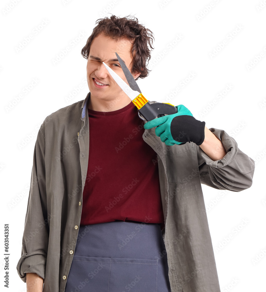 Male gardener with secateurs on white background
