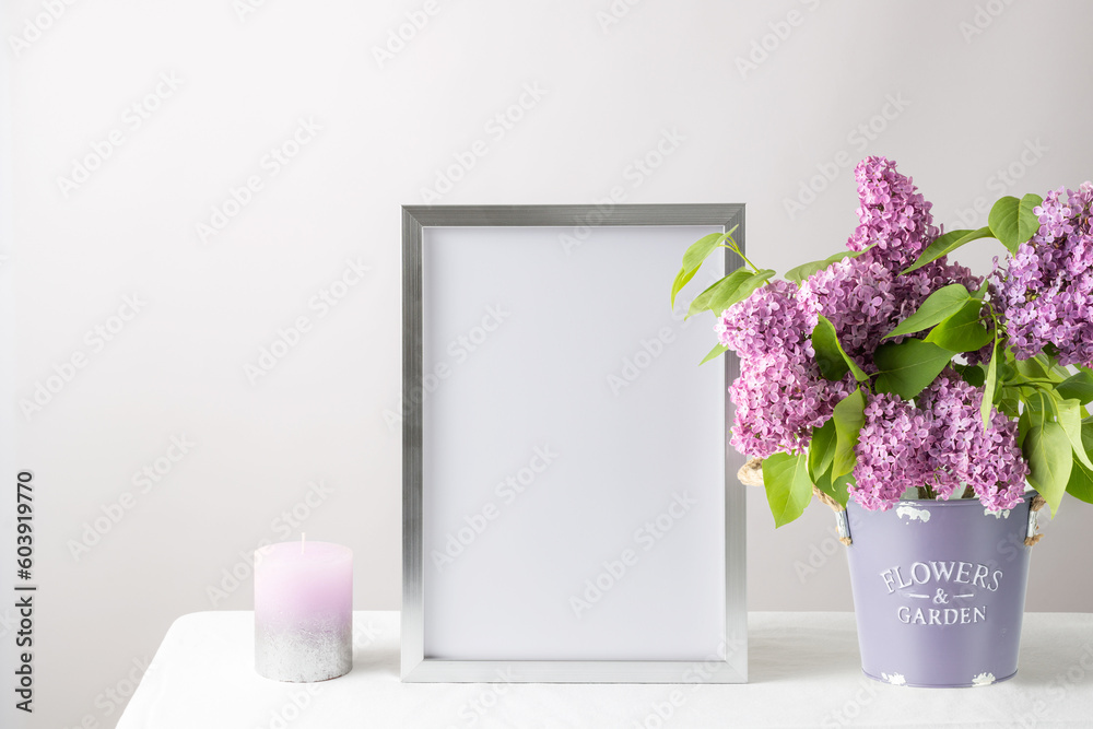 Floral card or poster mockup or silver photo frame in modern style with lilac plant flowers in bucke