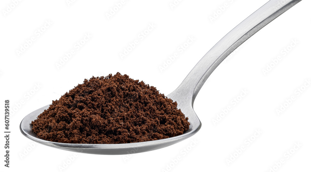 Ground coffee beans in spoon isolated on white background