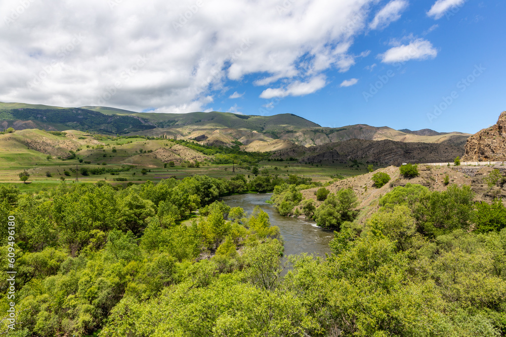 Mtkvari river valley landscape in Samtskhe Javakheti region in Southern Georgia with lush green vege