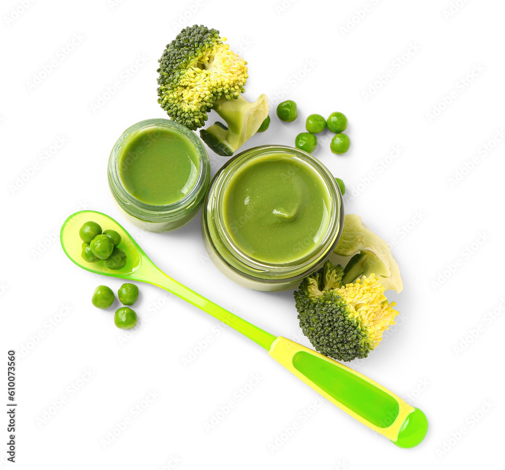 Jars with healthy baby food, broccoli and green peas on white background