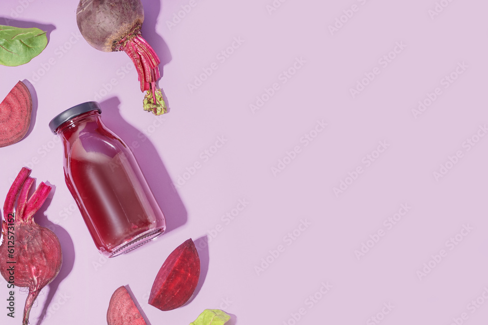 Bottle of healthy beet juice and spinach on lilac background