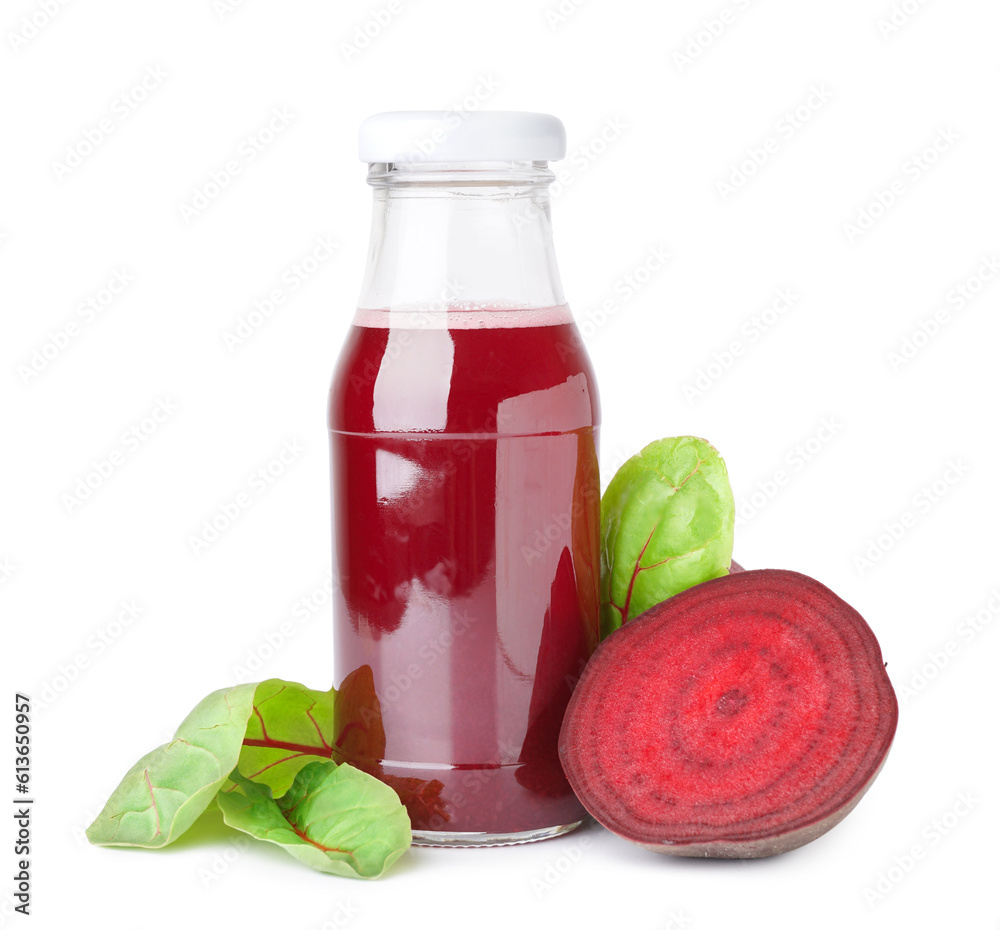 Bottle of healthy beet juice and spinach on white background