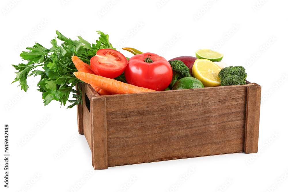 Wooden box with different fresh fruits and vegetables on white background