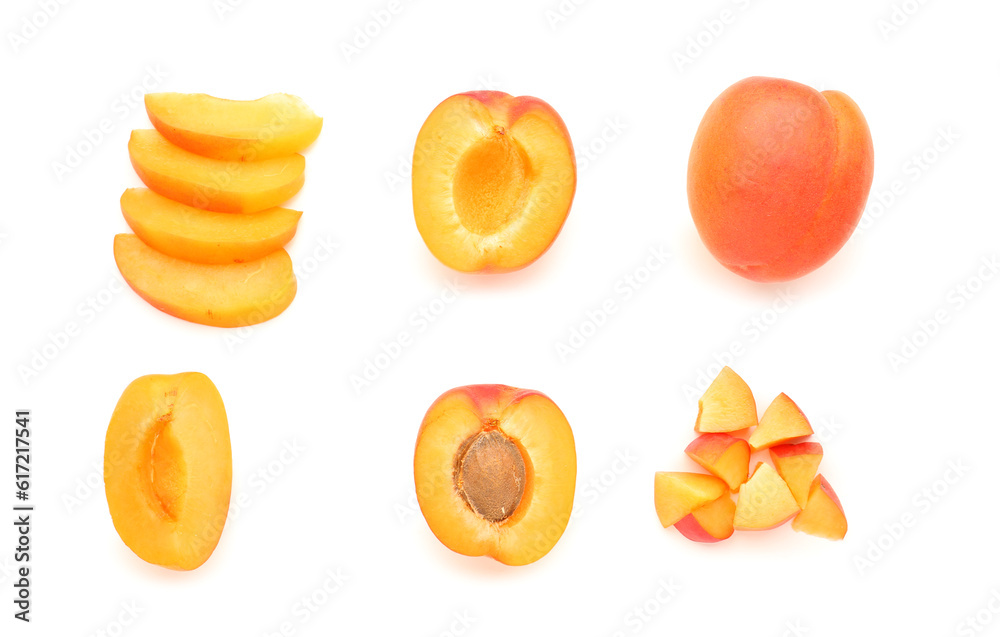 Composition with ripe apricots on white background