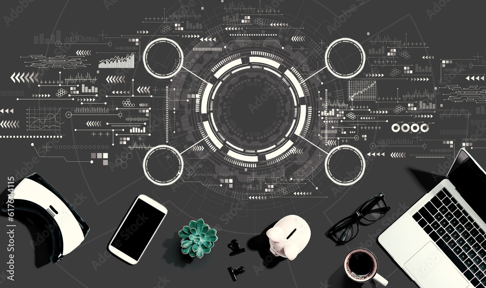 Tech circle with electronic gadgets and office supplies - flat lay