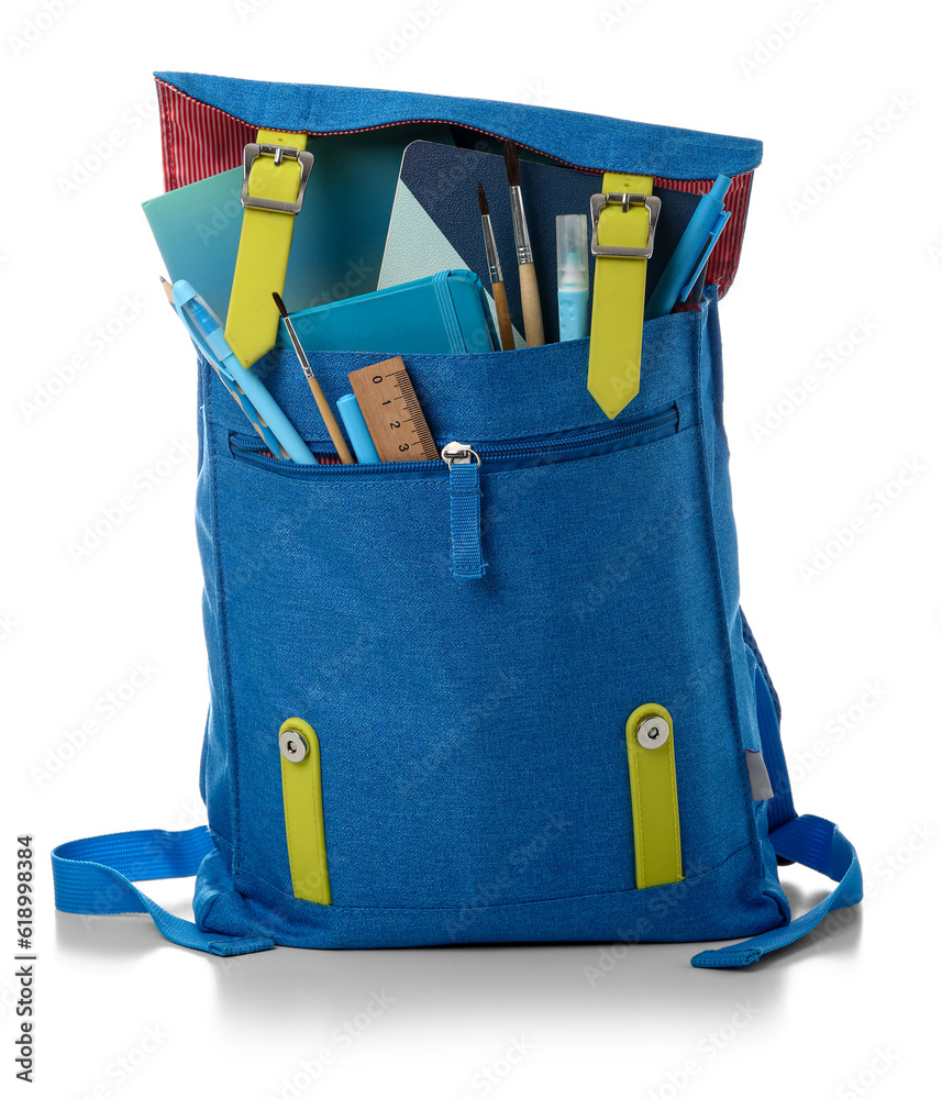 Blue school backpack with notebooks, brushes and markers on white background
